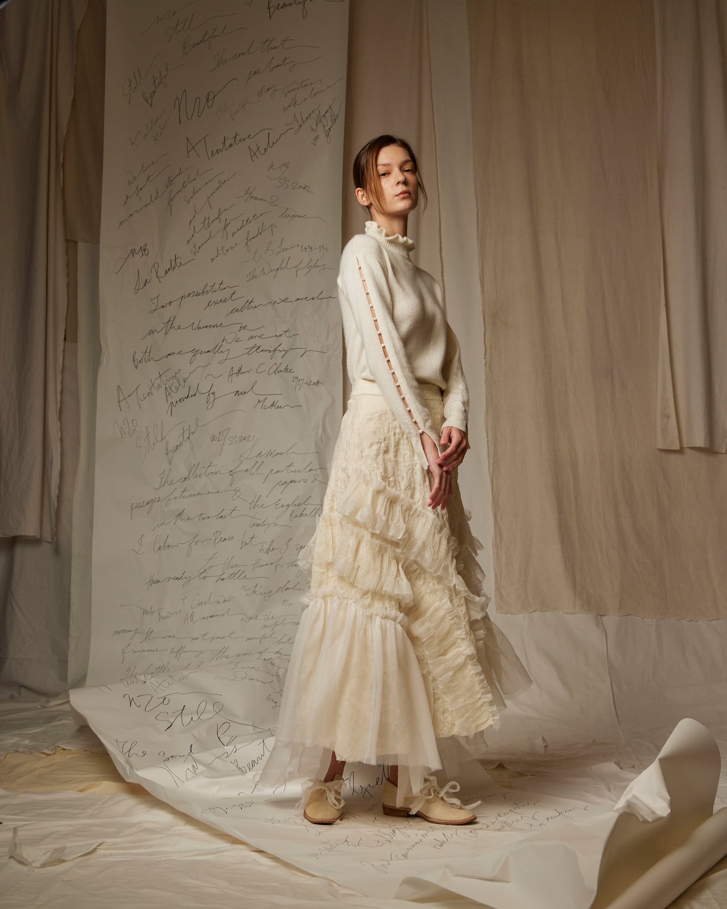 A Tentative Atelier AW22 Lookbook white knitwear and long tulle skirt