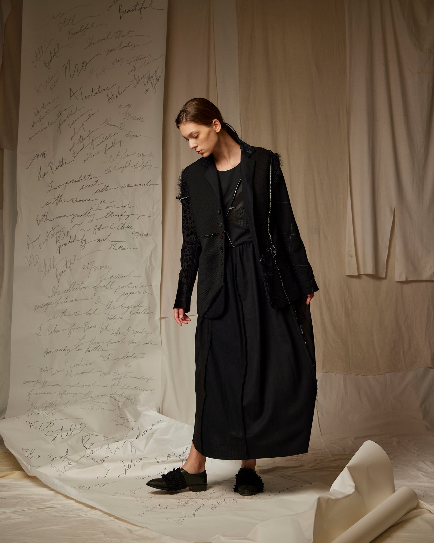 A Tentative Atelier SS23 Lookbook Womens black jacket and black dress ensemble