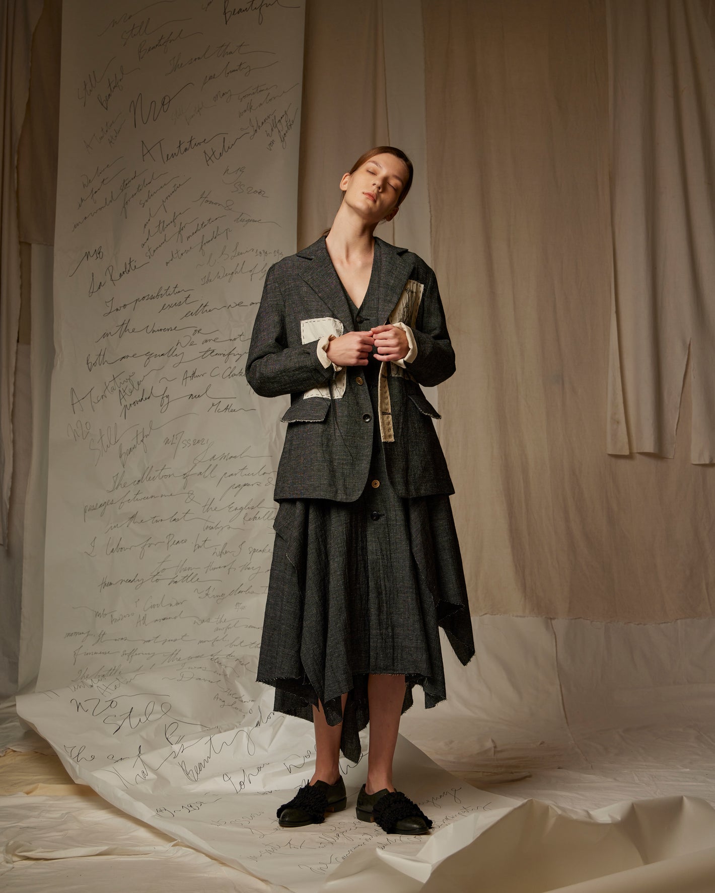 A Tentative Atelier SS23 Lookbook Womens dark grey check patchwork jacket and dress ensemble