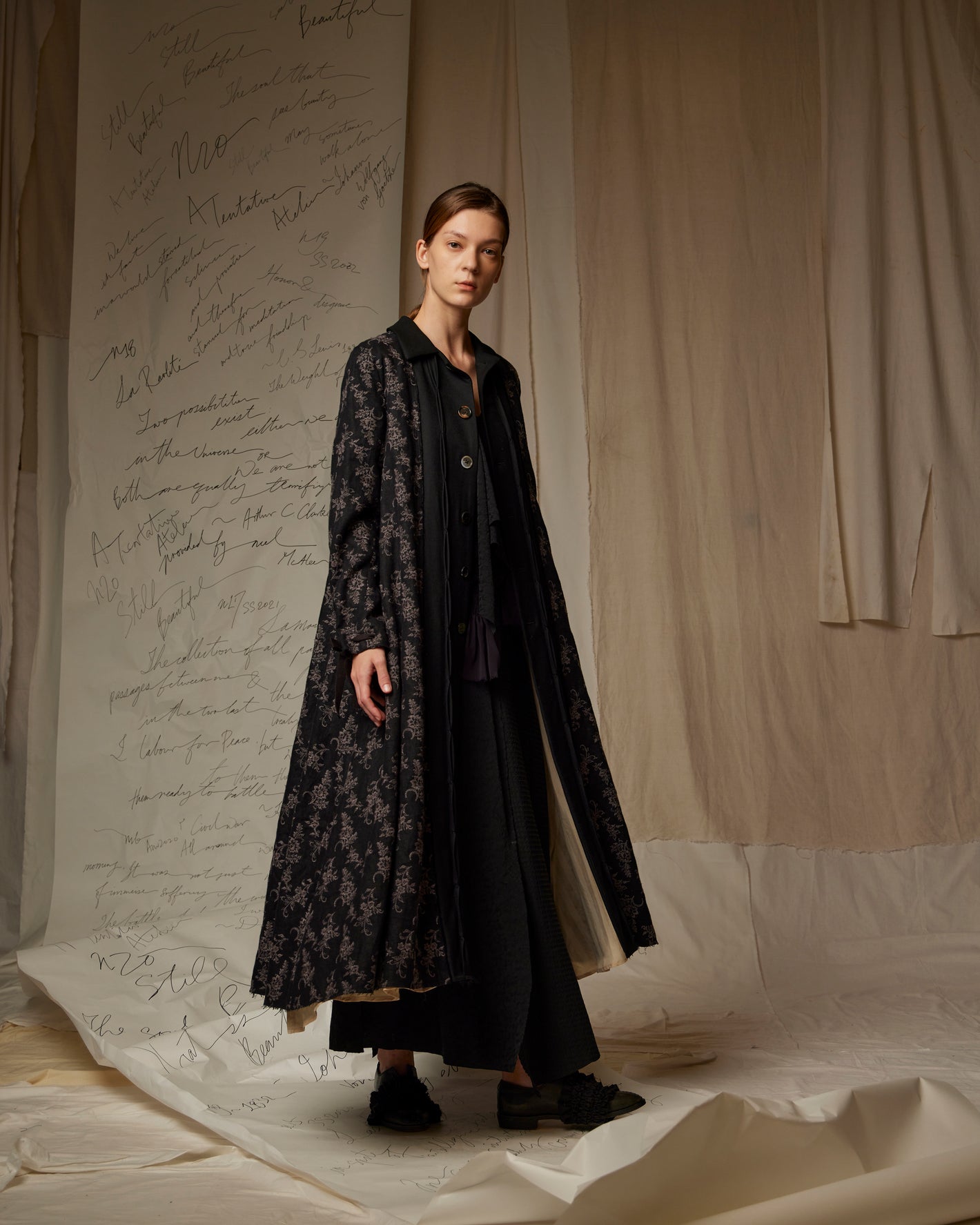 A Tentative Atelier SS23 Lookbook Womens black patterned coat  