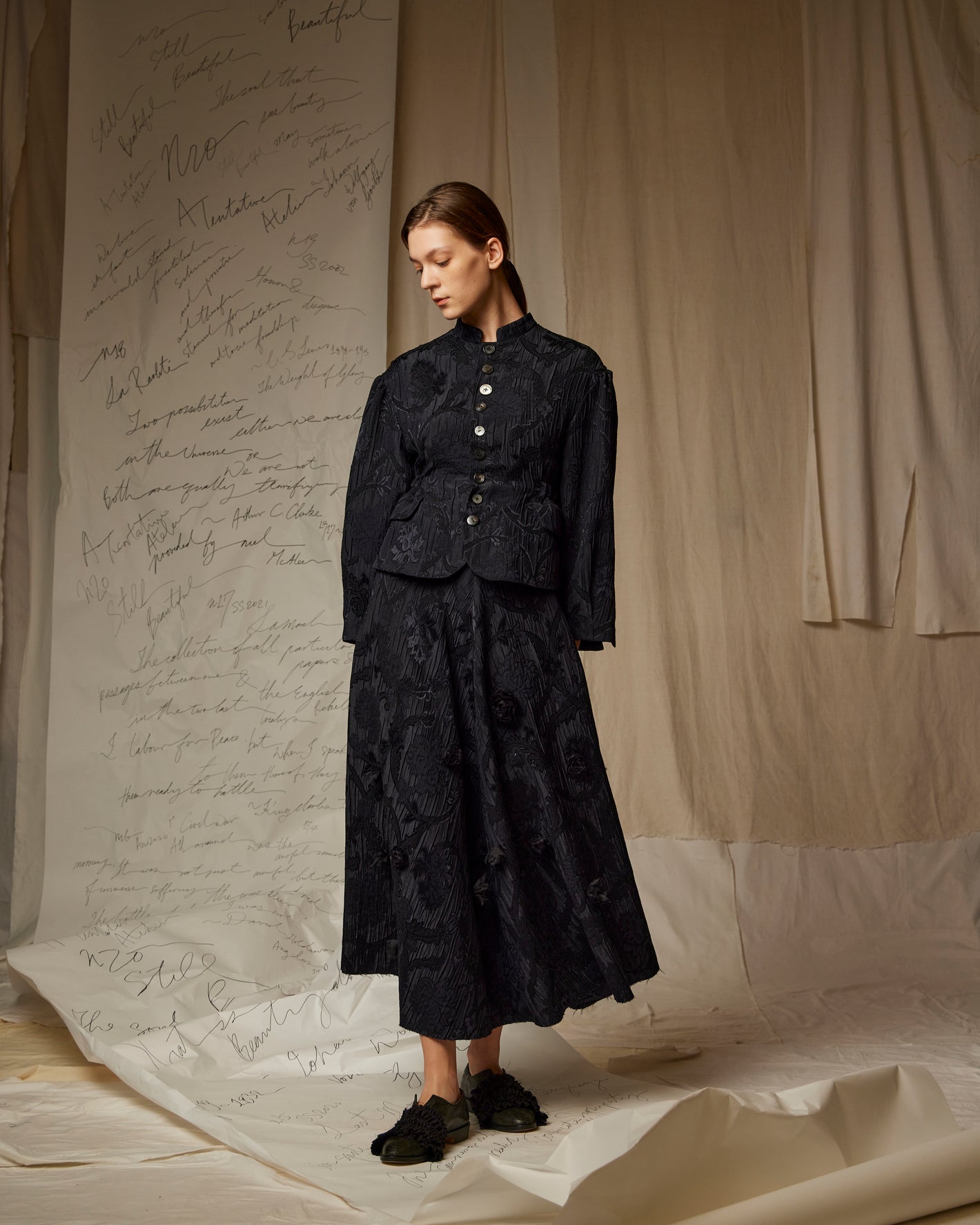 A Tentative Atelier AW22 Lookbook black embroidered jacket and skirt