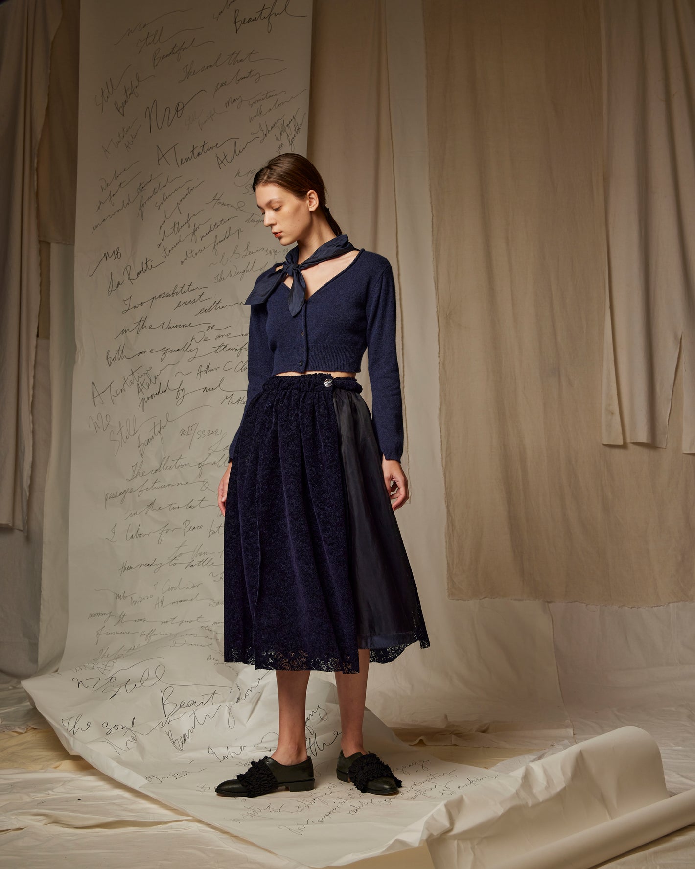 A Tentative Atelier AW22 Lookbook blue cropped knitwear and skirt
