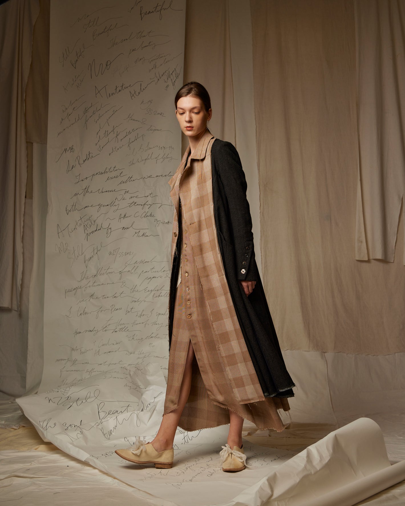 A Tentative Atelier SS23 Lookbook Womens brown check and black long coat