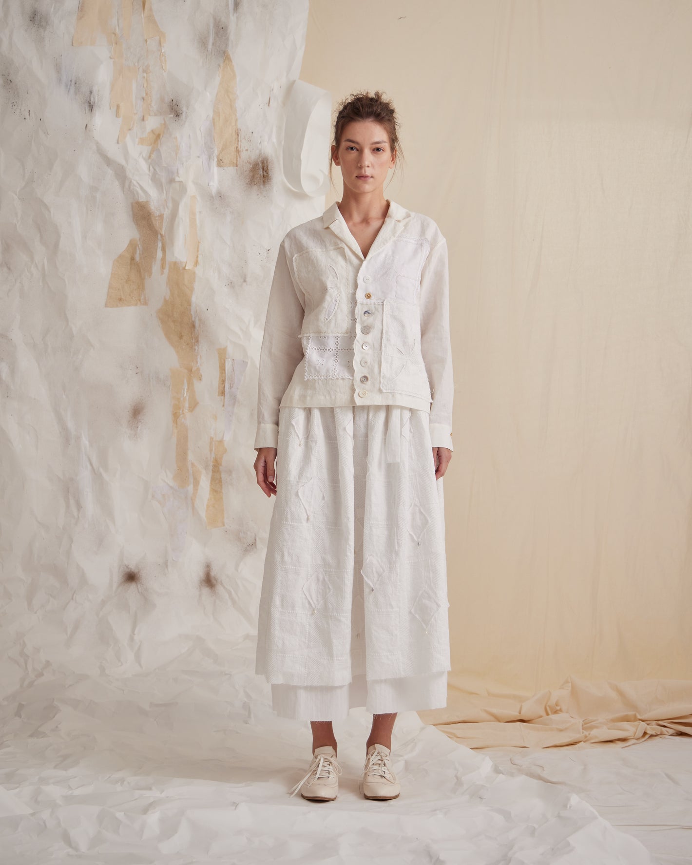 A Tentative Atelier SS23 Lookbook Womens white scalloped edge buttoned jacket and skirt ensemble