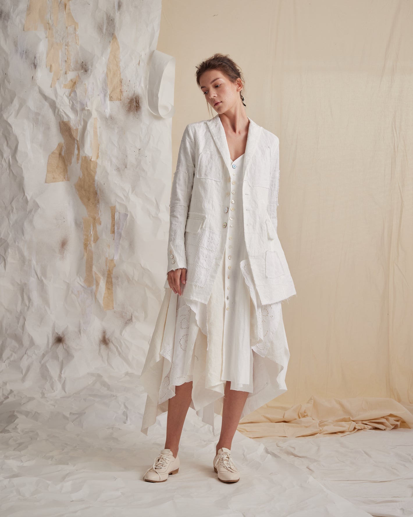 A Tentative Atelier SS23 Lookbook Womens white textured jacket and layered dress ensemble