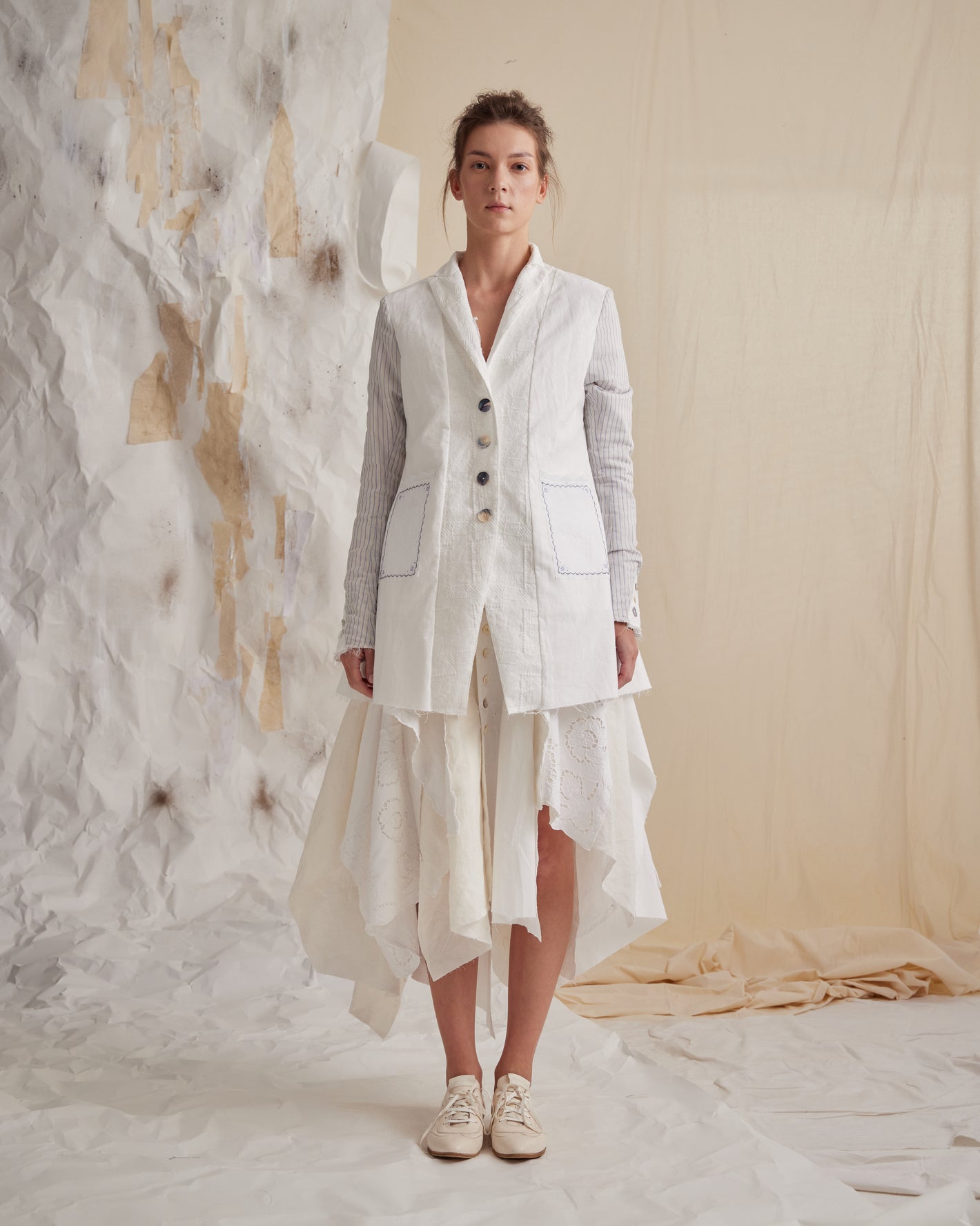 A Tentative Atelier SS23 Lookbook Womens white patch pocket jacket with stripe sleeves and white dress ensemble