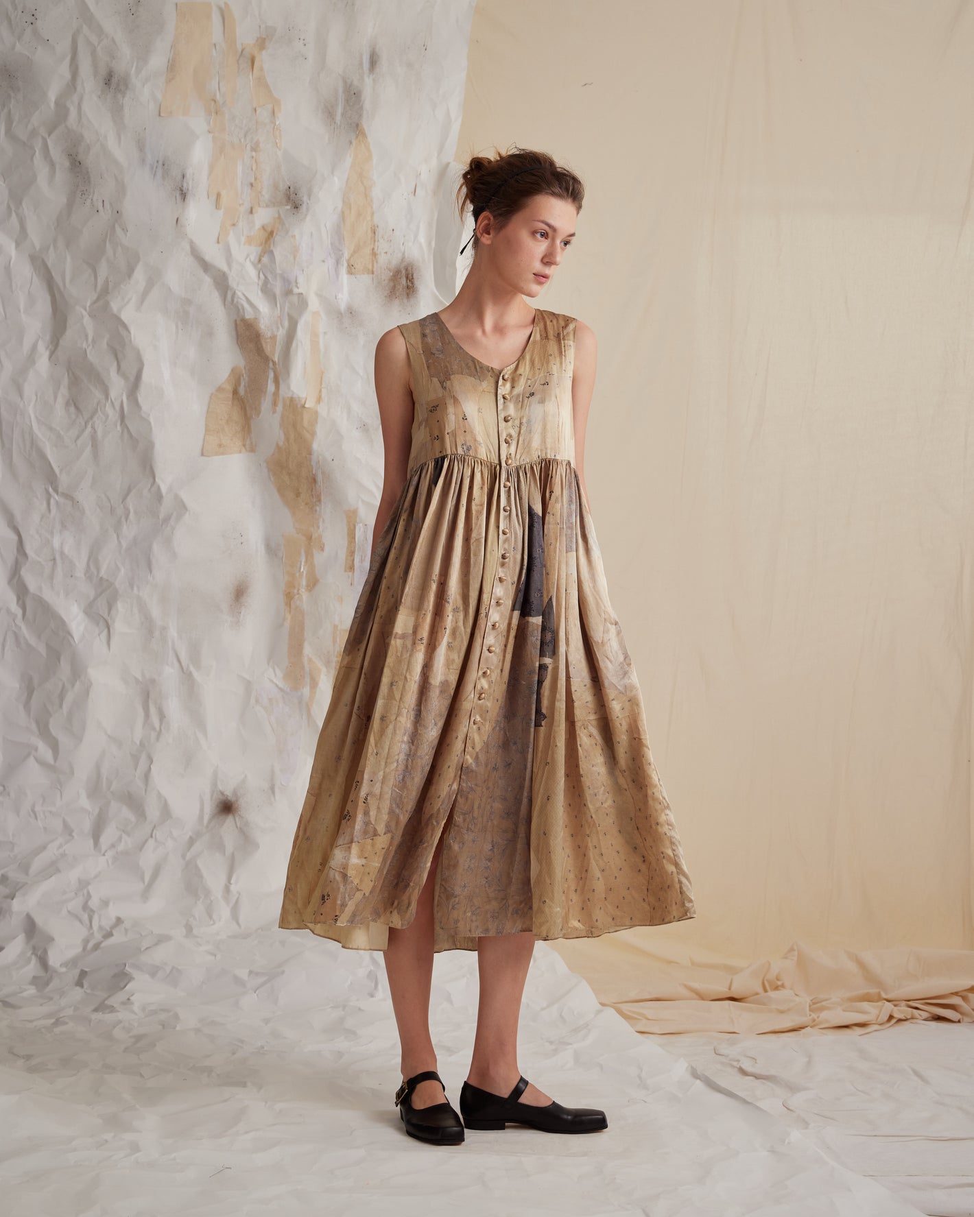 A Tentative Atelier SS23 Lookbook bronze printed silk button up dress
