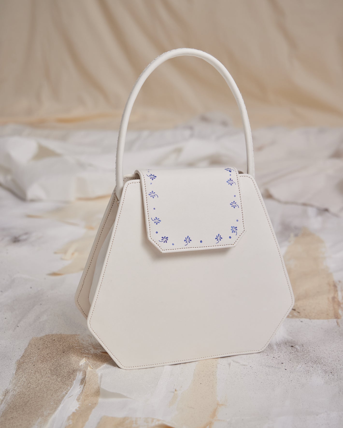 A Tentative Atelier SS23 Lookbook Womens white leather hexagonal top handle bag