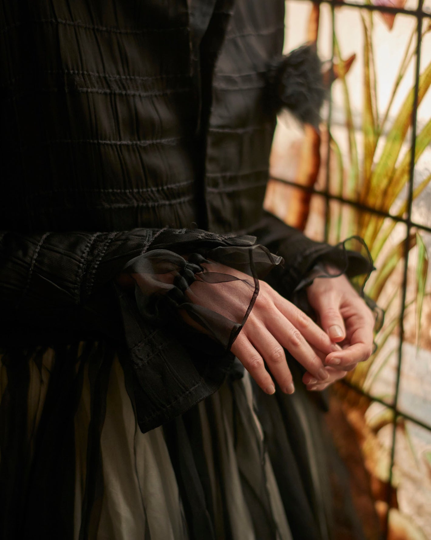 A Tentative Atelier AW20 Lookbook Womens crop of a black tulle coat sleeves