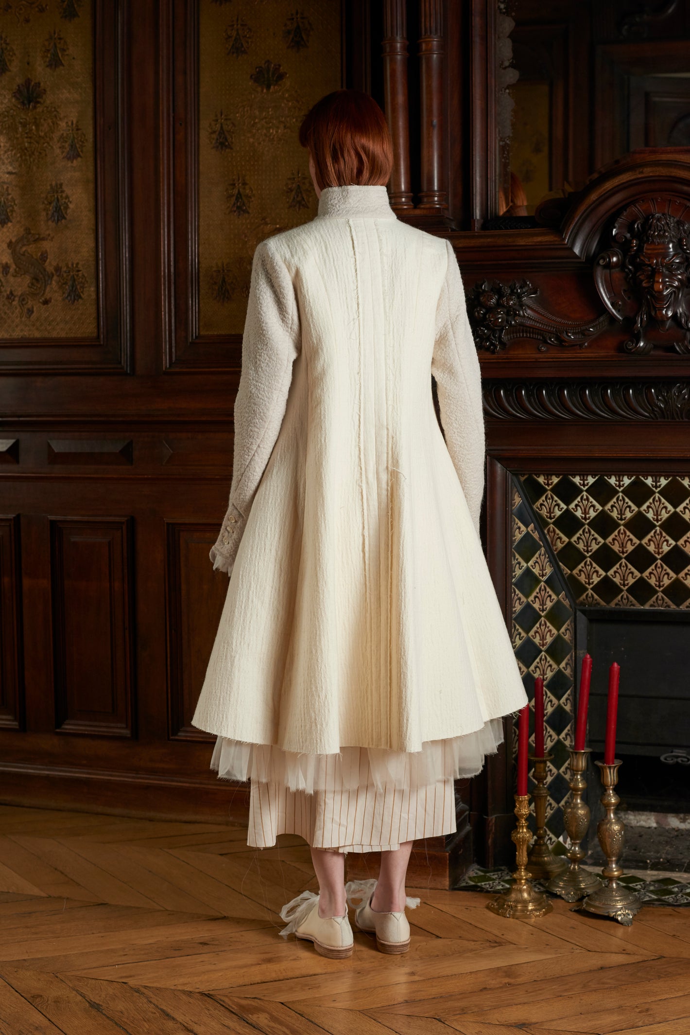 A Tentative Atelier AW20 Lookbook back of a white high neck single button coat
