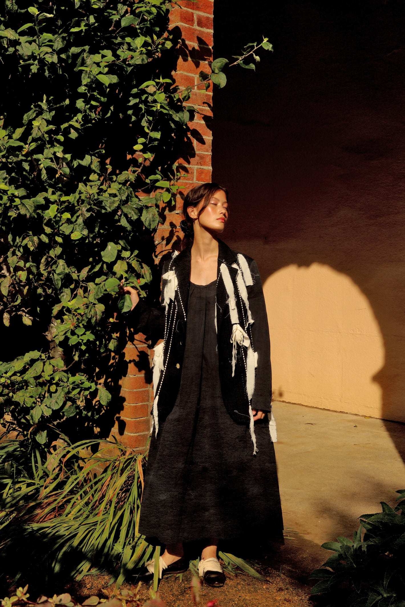 A Tentative Atelier SS24 Lookbook Womens ribbons jacket and black maxi dress