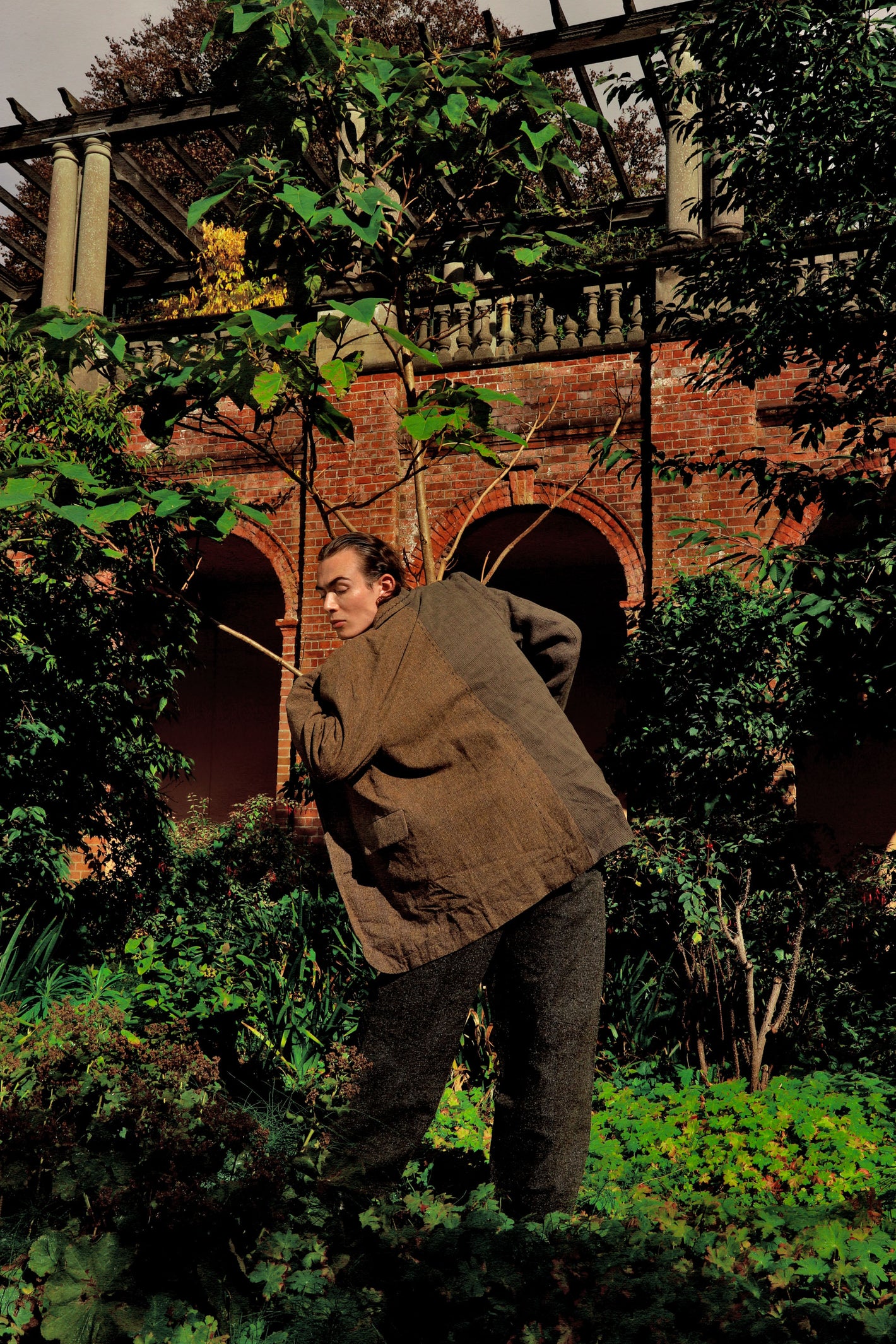 A Tentative Atelier SS24 Lookbook Mens back of a half-half patchwork jacket in brown