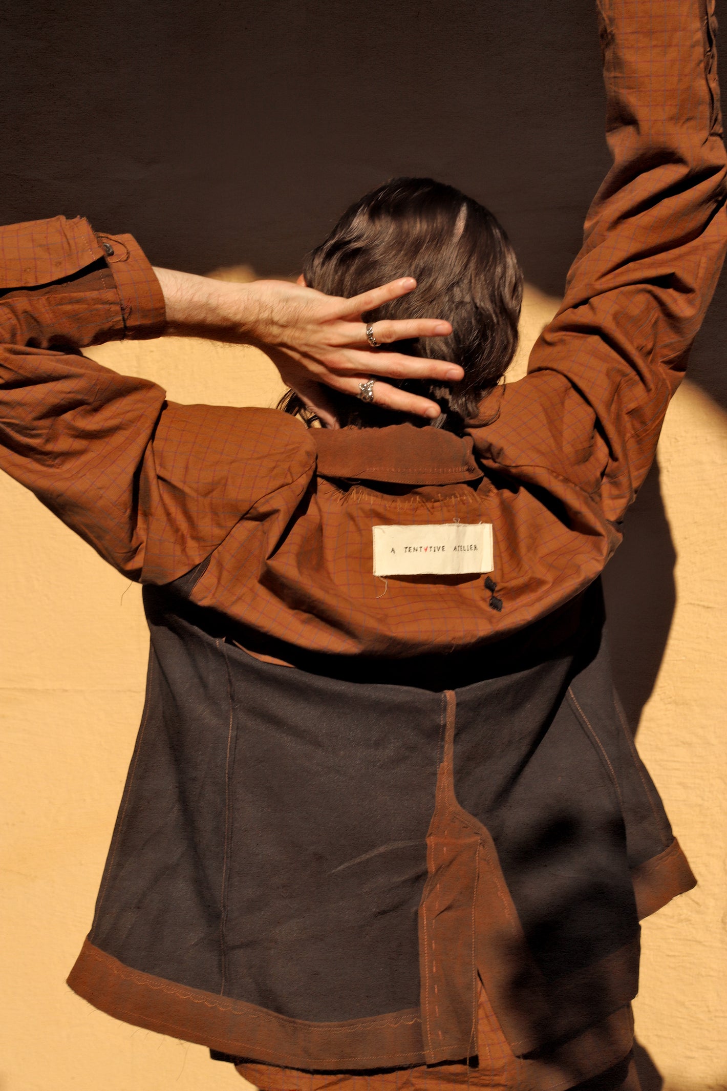 A Tentative Atelier SS24 Lookbook Mens reversible rust red jacket, crop of the back