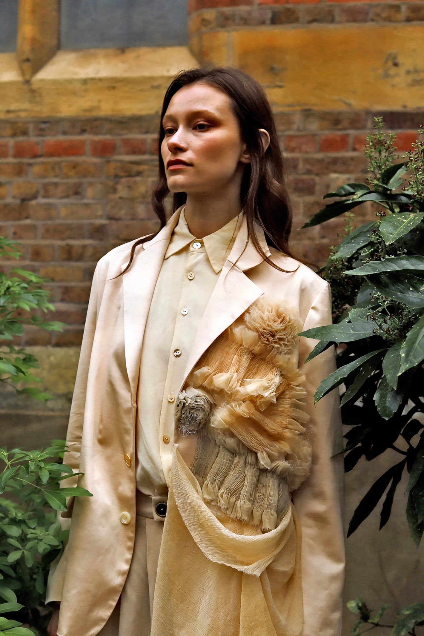 A Tentative Atelier AW23 Lookbook Womens ivory silk coat with hand smocked tulle and flower detail crop