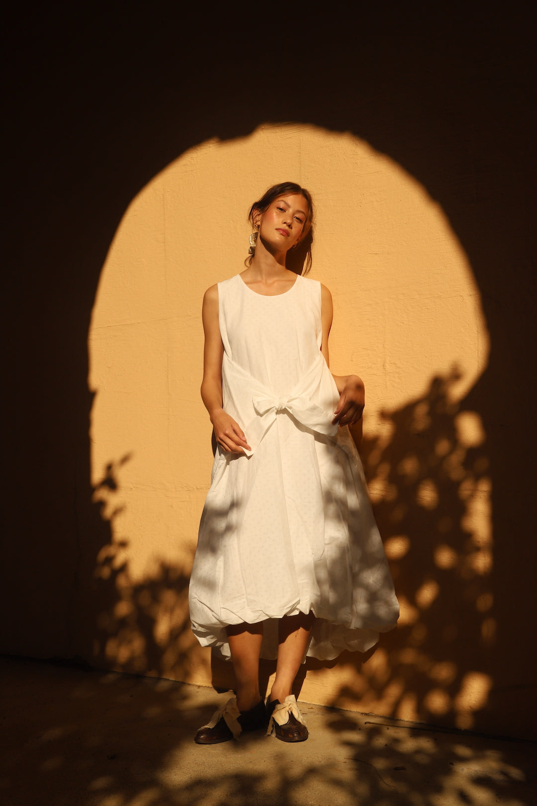 A Tentative Atelier SS24 Lookbook detail, Womens ribbon waist sleeveless dress