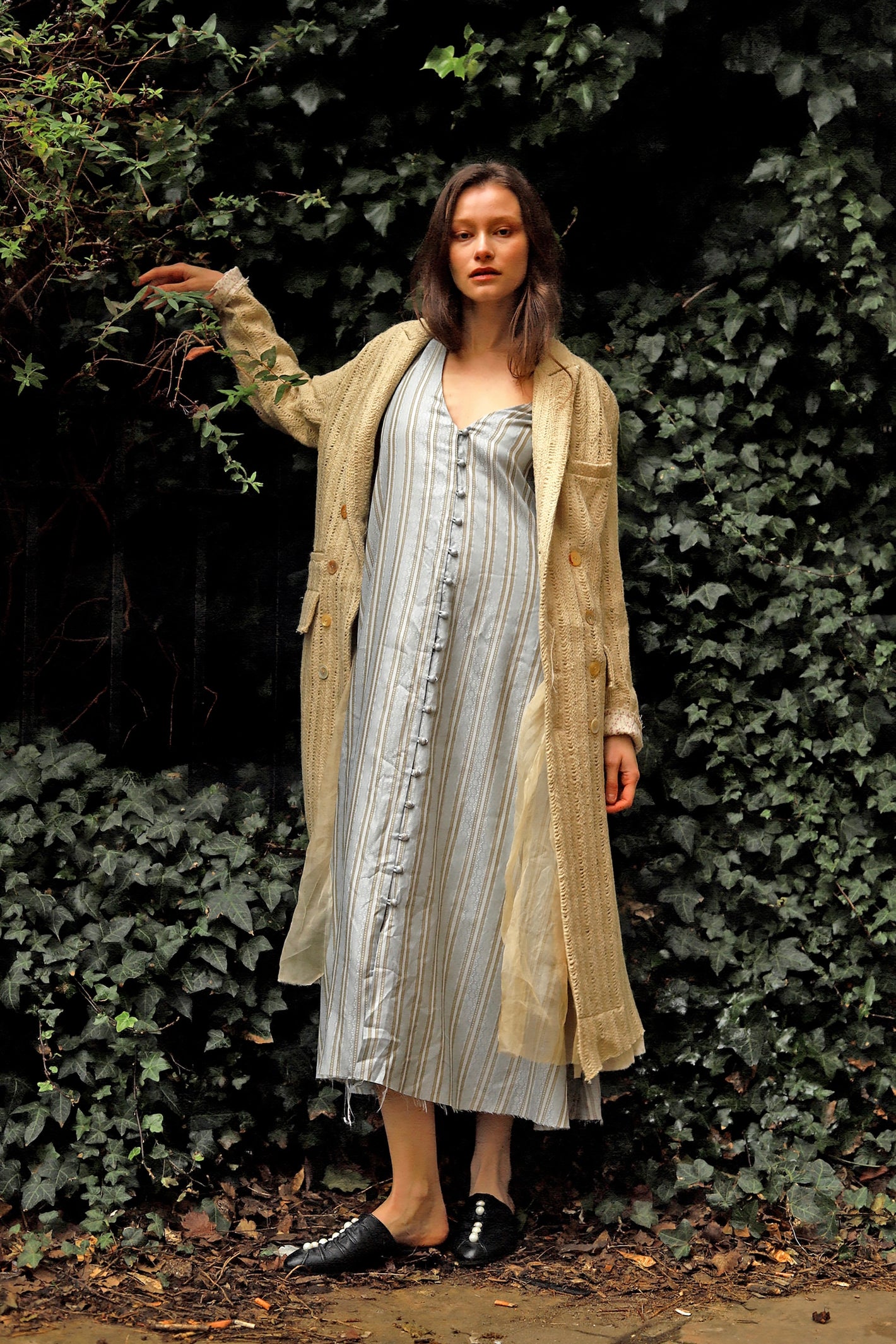 A Tentative Atelier AW23 Lookbook Womens long beige coat with striped button-down slip dress