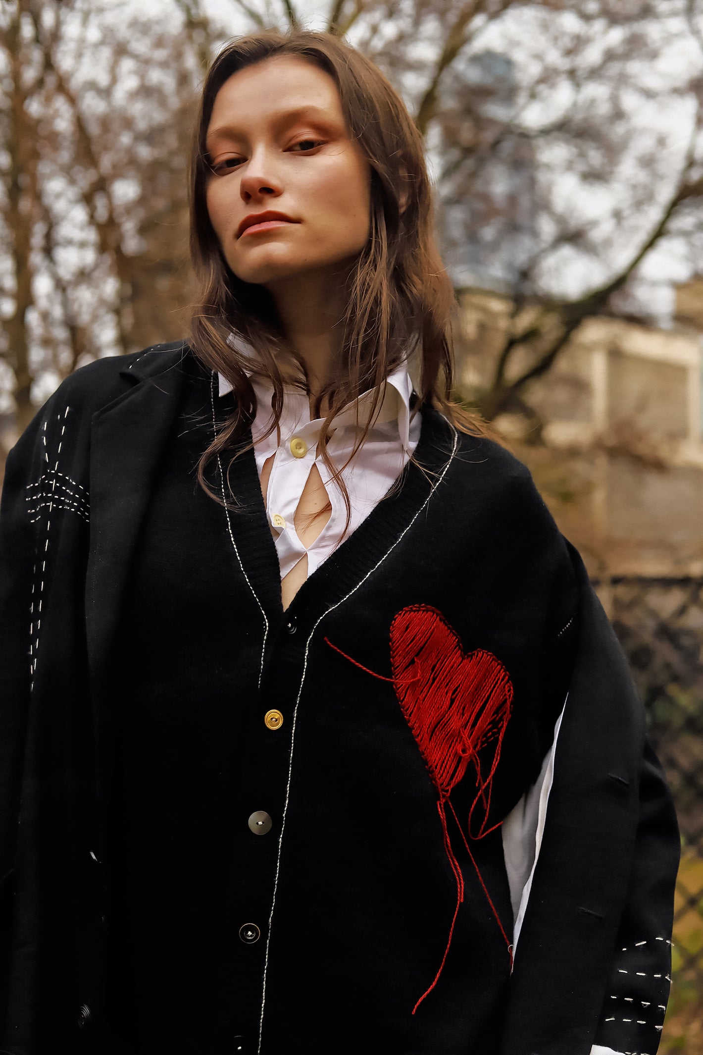 A Tentative Atelier AW23 Lookbook Womens black coat with embroidered red heart patch crop