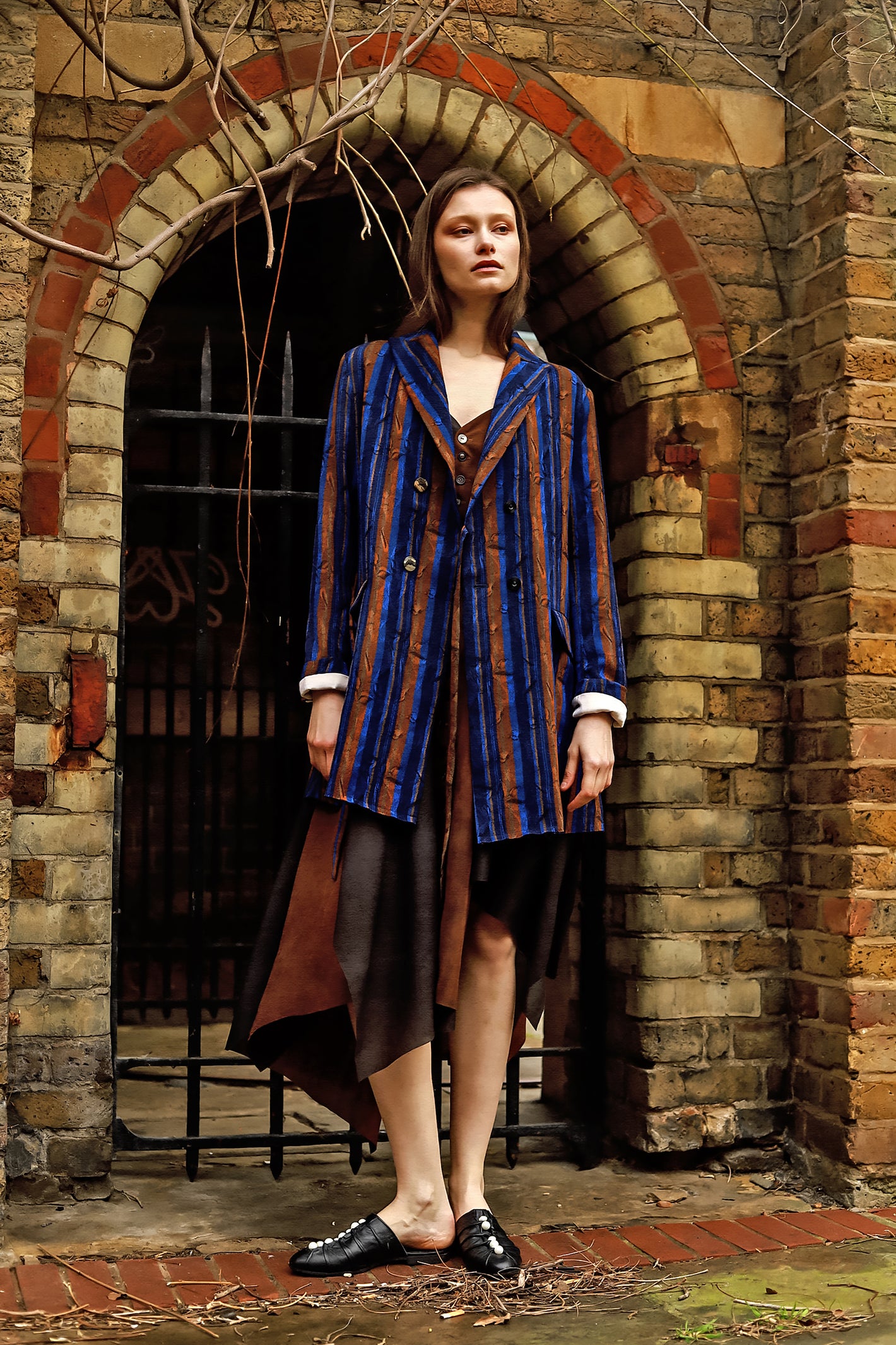 A Tentative Atelier AW23 Lookbook Womens striped velvet jacket and brown slip dress ensemble