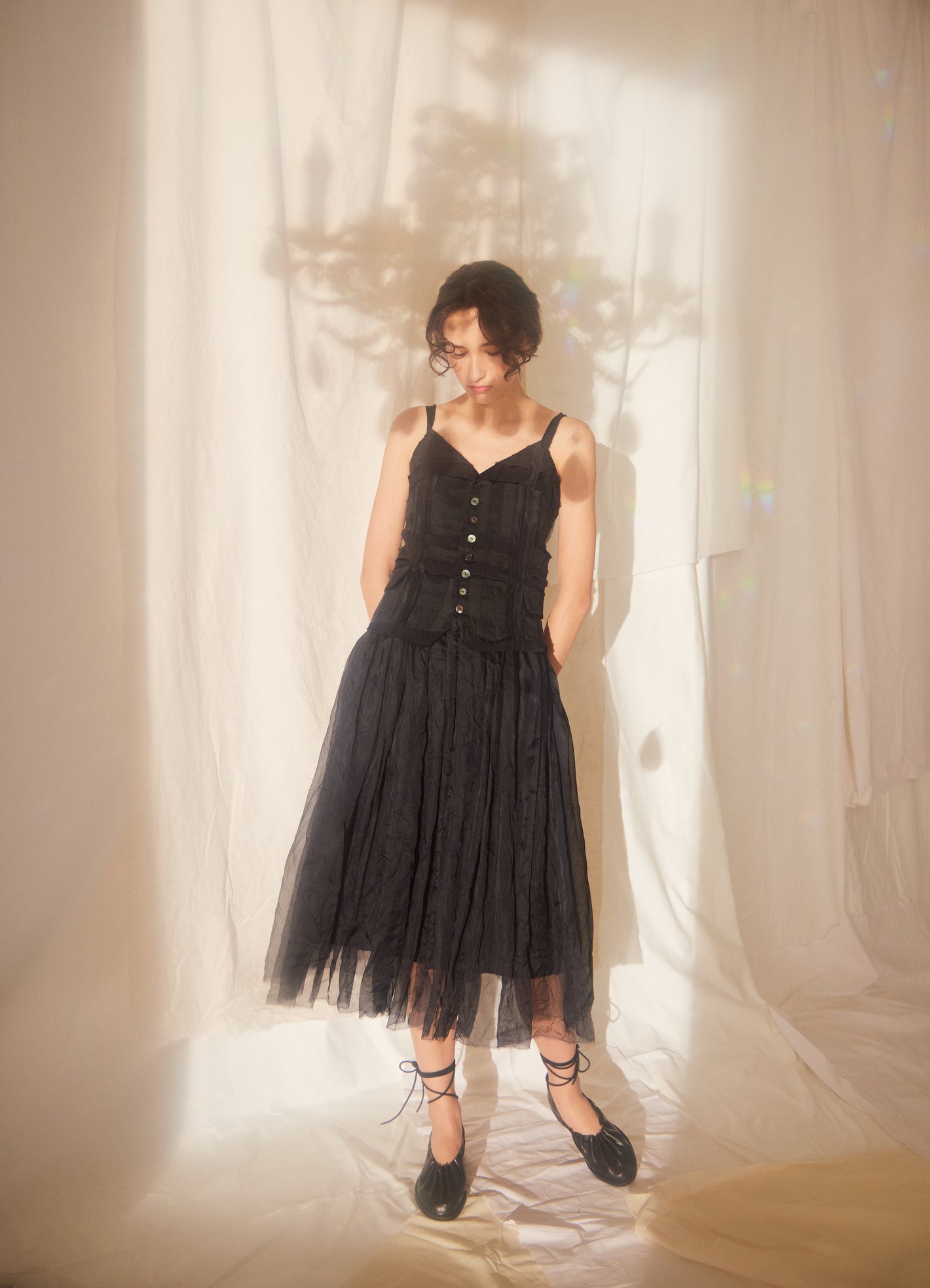 A Tentative Atelier SS22 Lookbook buttons top and ballerina skirt black dress