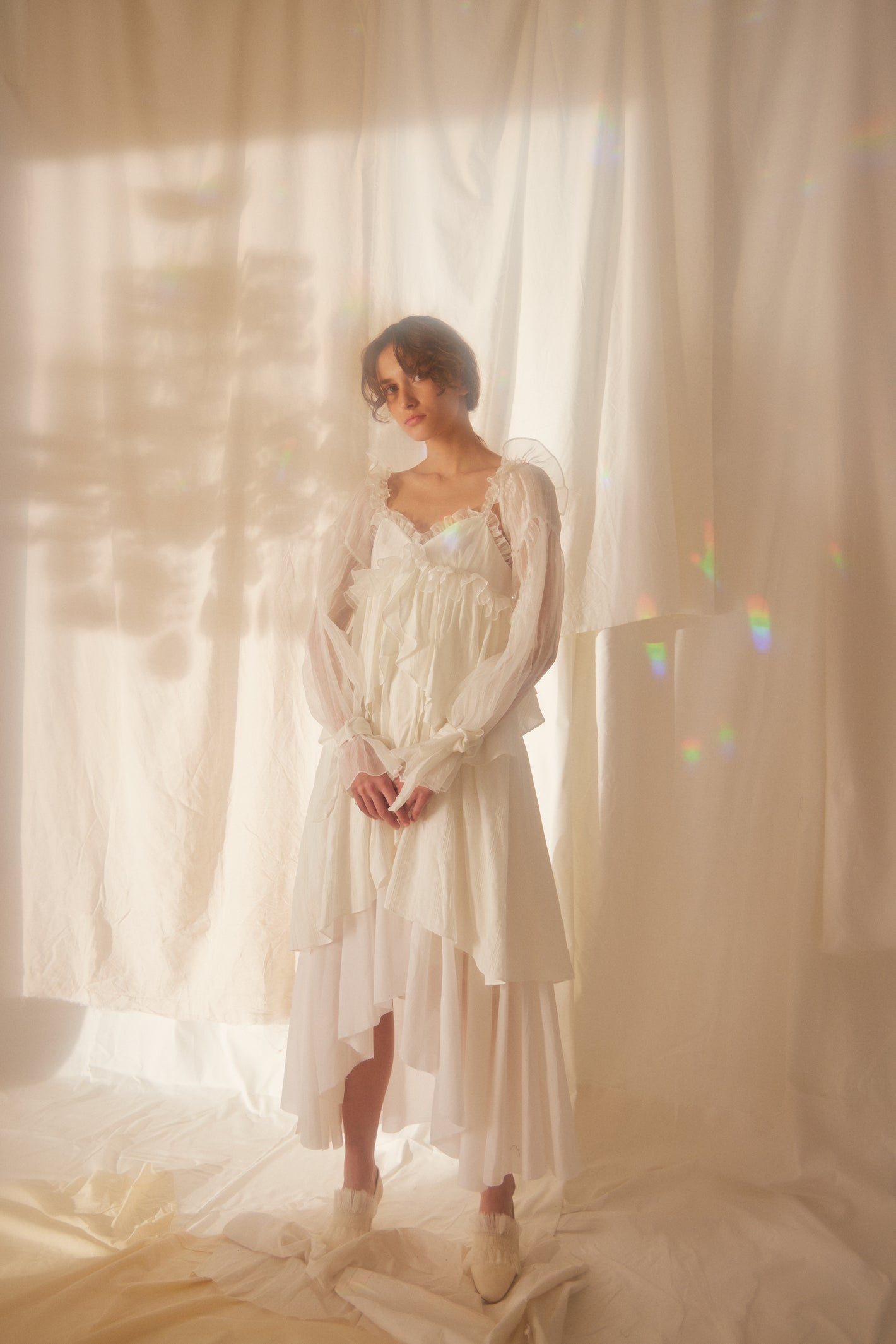 A Tentative Atelier SS22 Lookbook white multi tiered ruffles dress