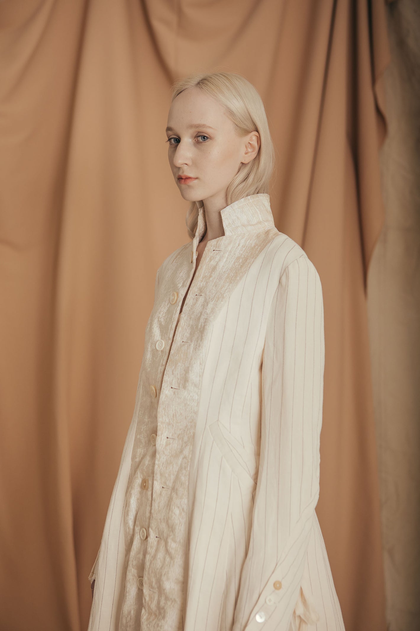 A Tentative Atelier SS20 Lookbook Womens crop of high collar white striped coat