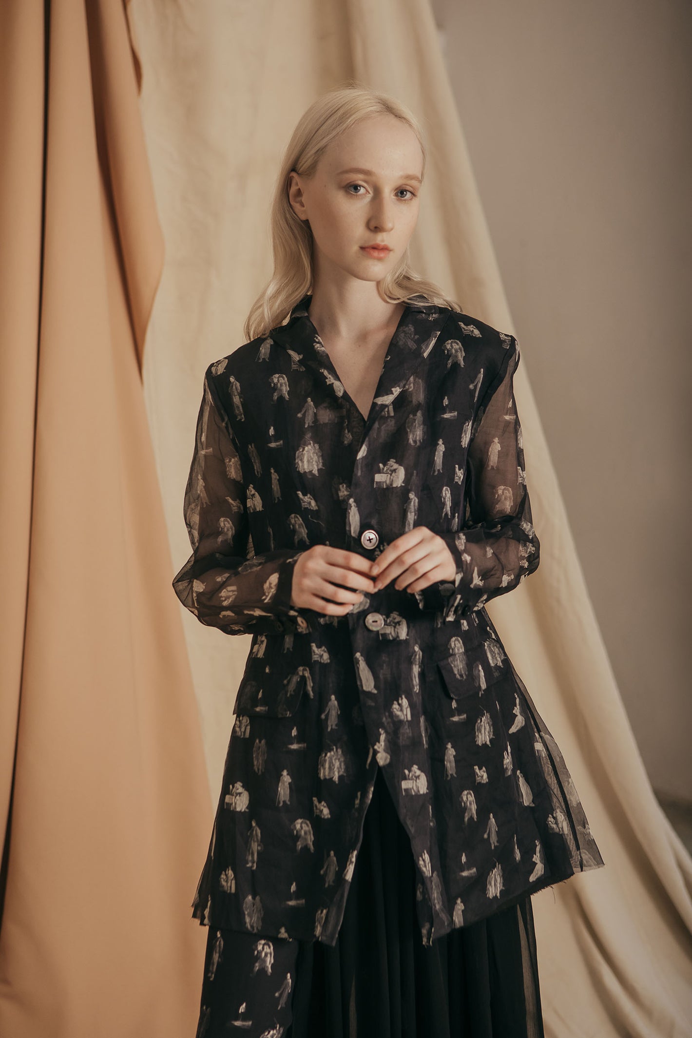 A Tentative Atelier SS20 Lookbook Womens crop of black printed jacket with sheer sleeves