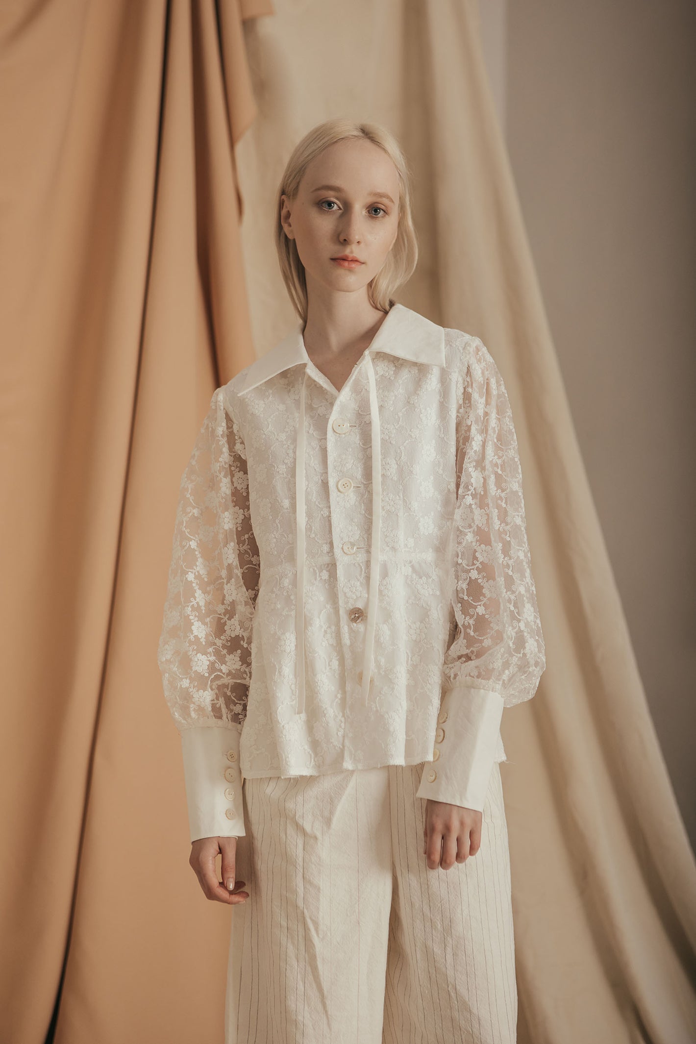 A Tentative Atelier SS20 Lookbook Womens crop of white lace top with shirt cuffs
