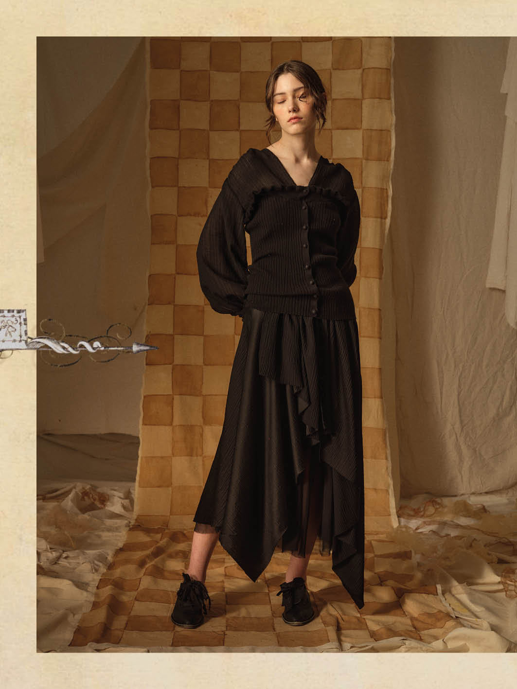 A Tentative Atelier AW21 Lookbook Womens black sheer sleeves cardigan and black multi layered skirt