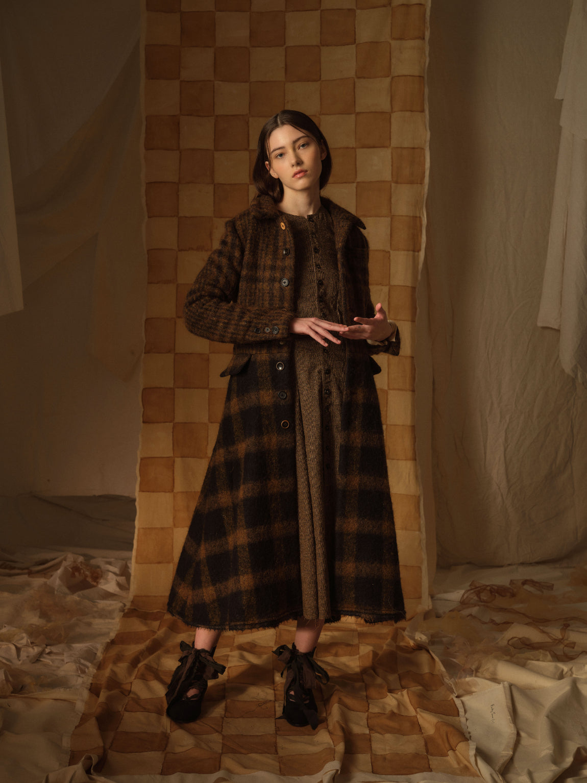 A Tentative Atelier AW21 Lookbook Womens brown check coat and long textured dress