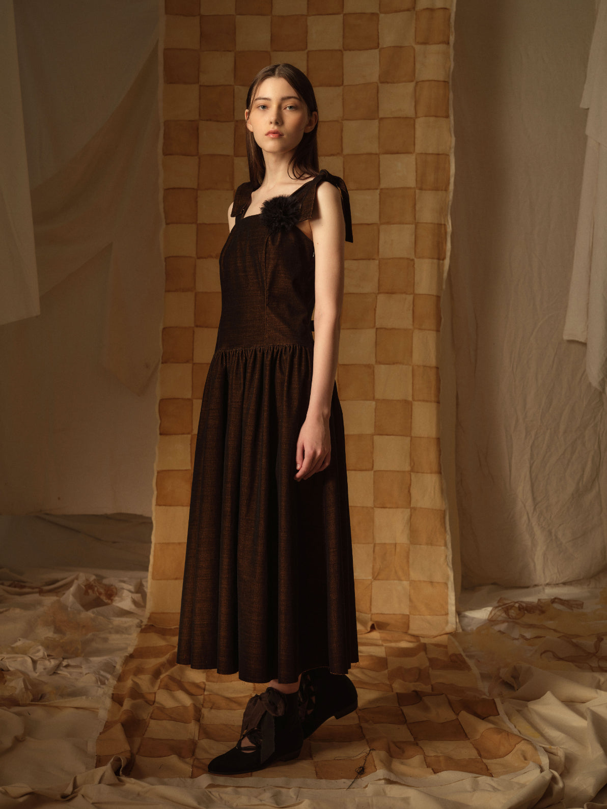 A Tentative Atelier AW21 Lookbook Womens chocolate brown long dress with tulle flower appliqué
