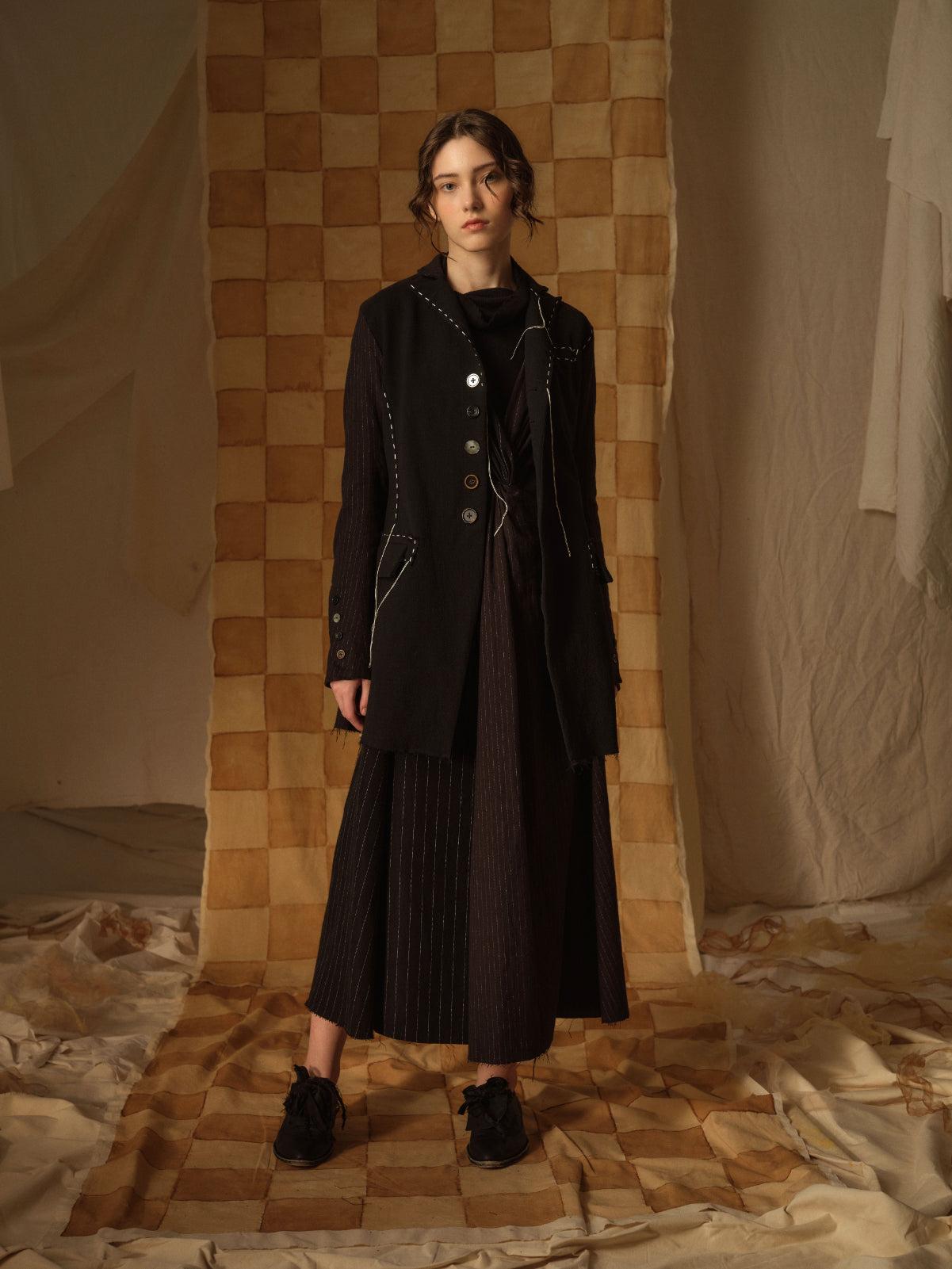 A Tentative Atelier AW21 Lookbook Womens black knee length coat with white embroidery and long dress