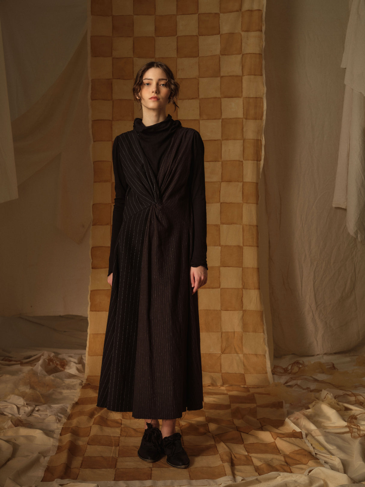 A Tentative Atelier AW21 Lookbook Womens black and brown striped long dress with gathered front