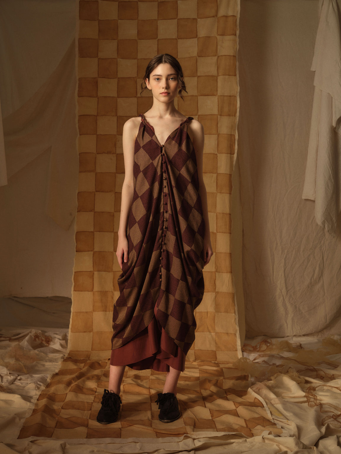 A Tentative Atelier AW21 Lookbook Womens draped brown check sleeveless buttoned dress