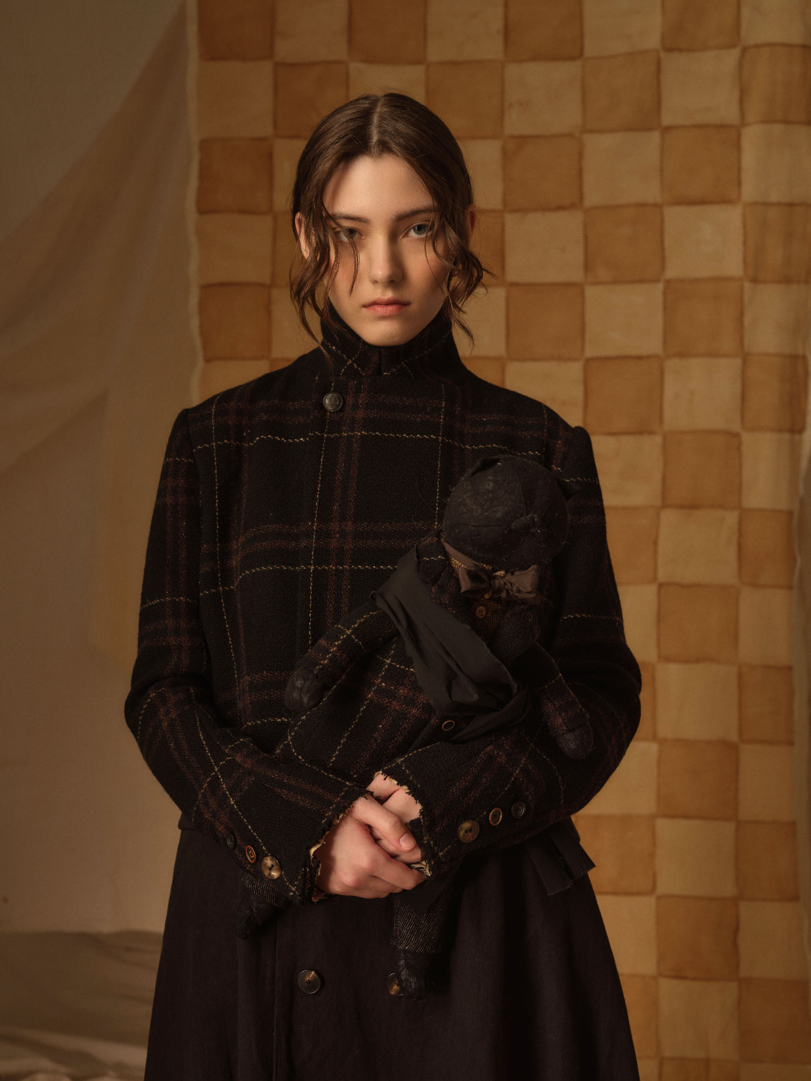 A Tentative Atelier AW21 Lookbook Womens crop of brown check coat and plushie