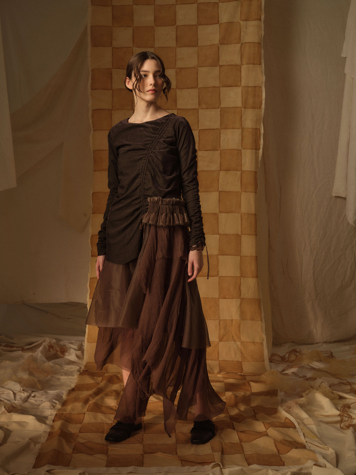 A Tentative Atelier AW21 Lookbook Womens brown long dress with a ruched top and contrasting tulle skirt and smocked waist panel