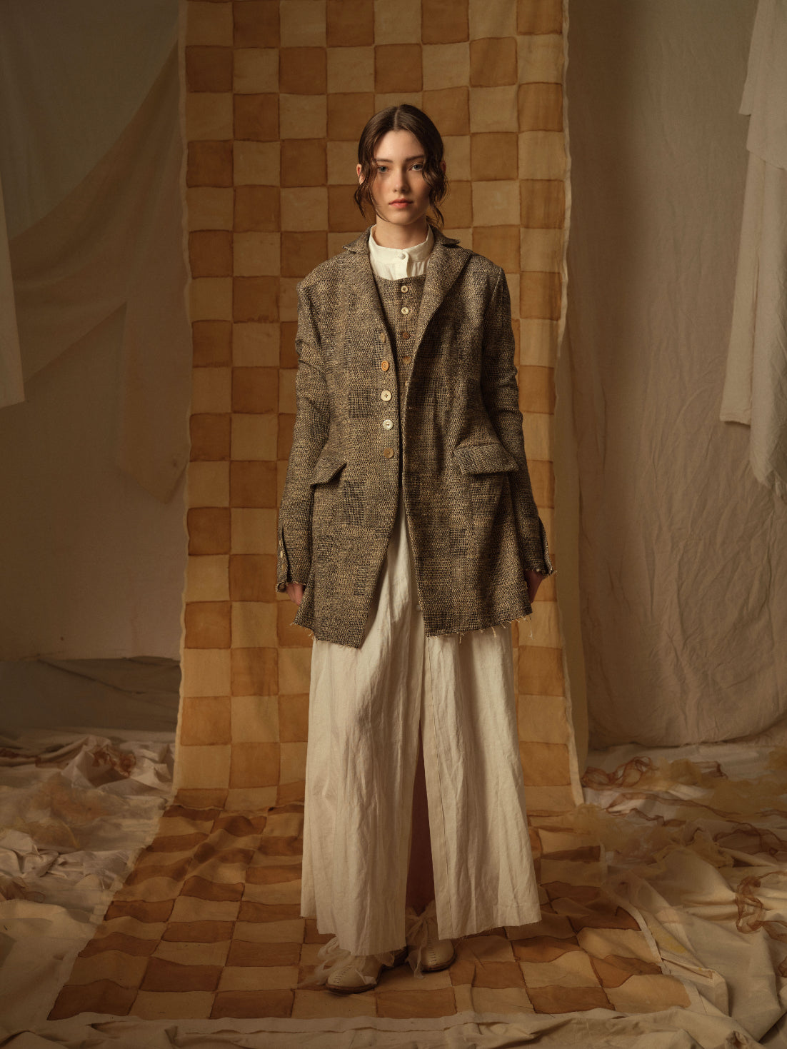 A Tentative Atelier AW21 Lookbook Womens brown oversized jacket with long cream dress