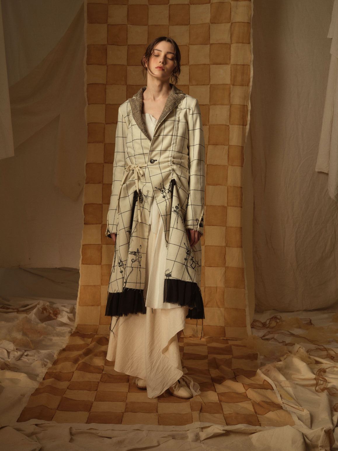 A Tentative Atelier AW21 Lookbook Womens black and white wide check single button coat with gathers on the waist