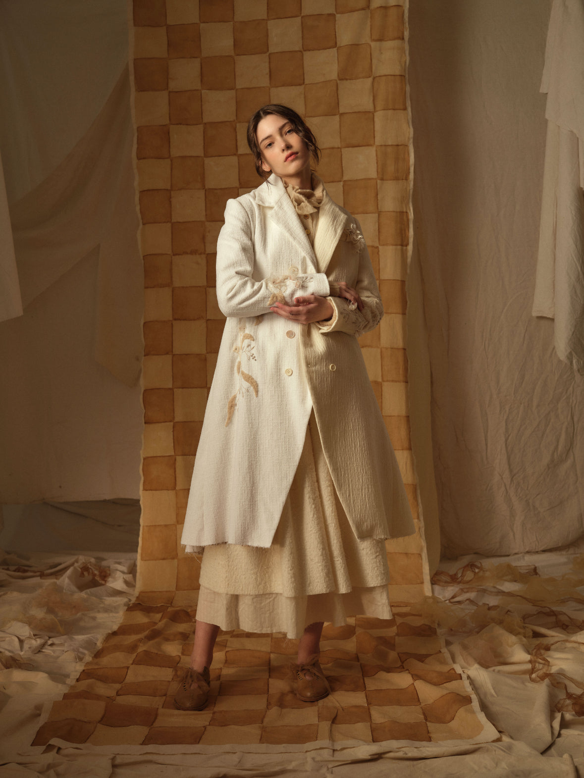 A Tentative Atelier AW21 Lookbook Womens textured white coat with embroidery