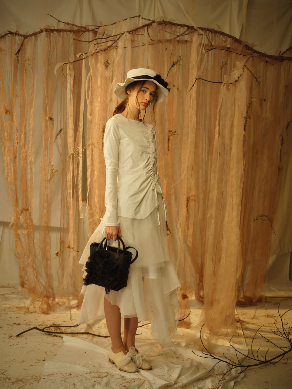 A Tentative Atelier SS21 Lookbook Womens white dress and black flower appliqué top handle bag
