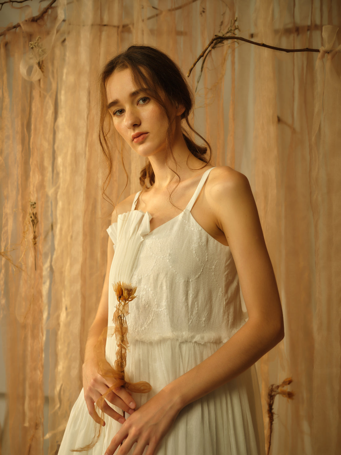 A Tentative Atelier SS21 Lookbook Womens crop of an embroidered white dress with straps
