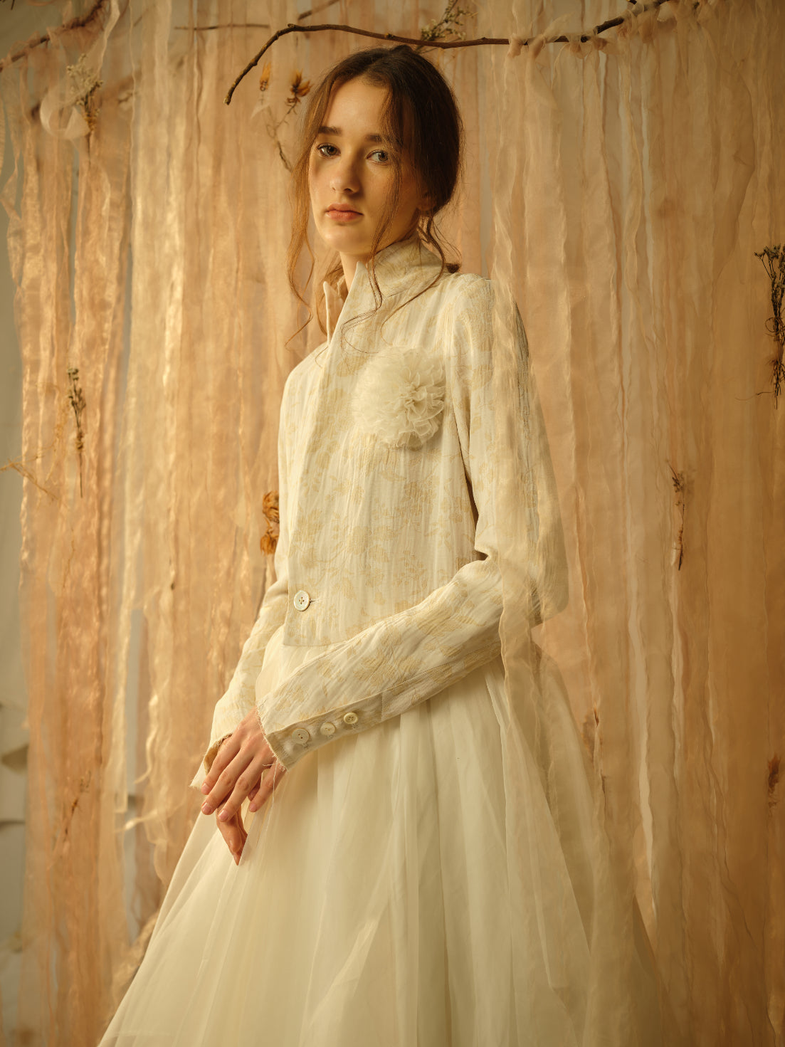 A Tentative Atelier SS21 Lookbook Womens crop of a white high collar dress coat with flower appliqué