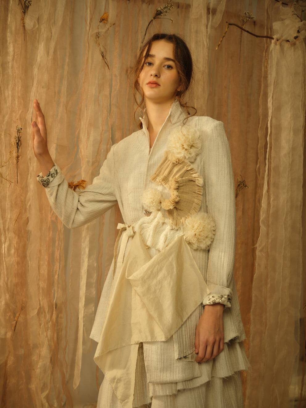 A Tentative Atelier SS21 Lookbook Womens greige high collar jacket with multiple flower and smocked appliqué