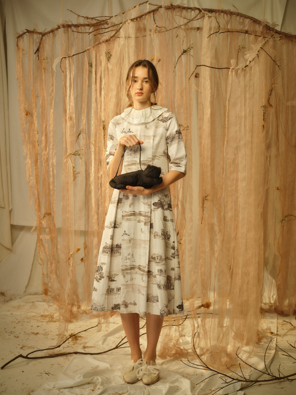 A Tentative Atelier SS21 Lookbook Womens round collar printed midi dress and black top handle cat shaped bag
