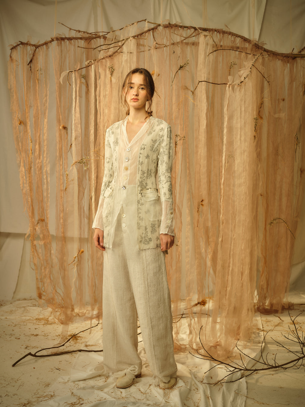A Tentative Atelier SS21 Lookbook Womens beige semi sheer panel shirt jacket and textred beige trousers