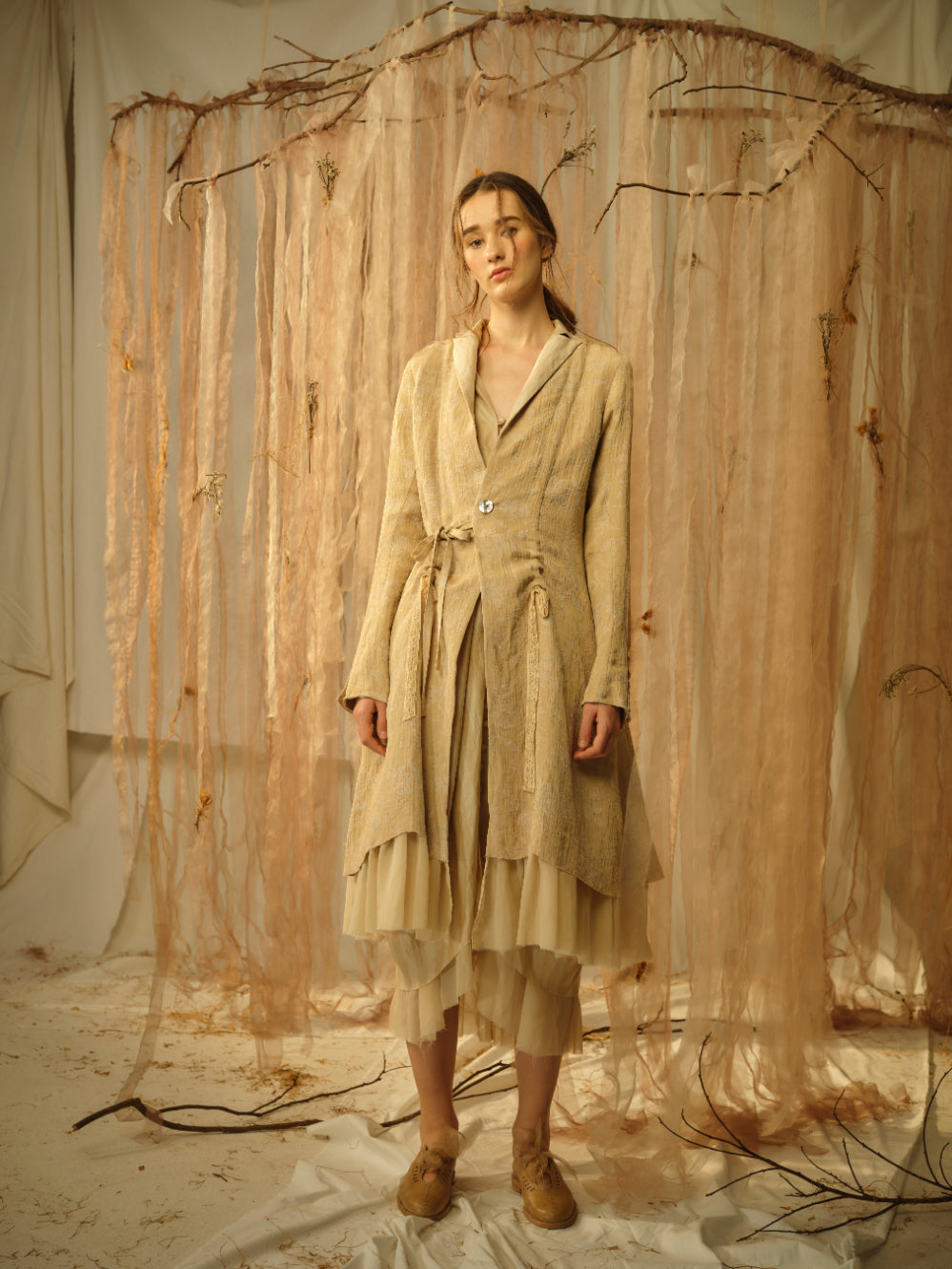 A Tentative Atelier SS21 Lookbook Womens beige gathered waist coat with ruffle hem