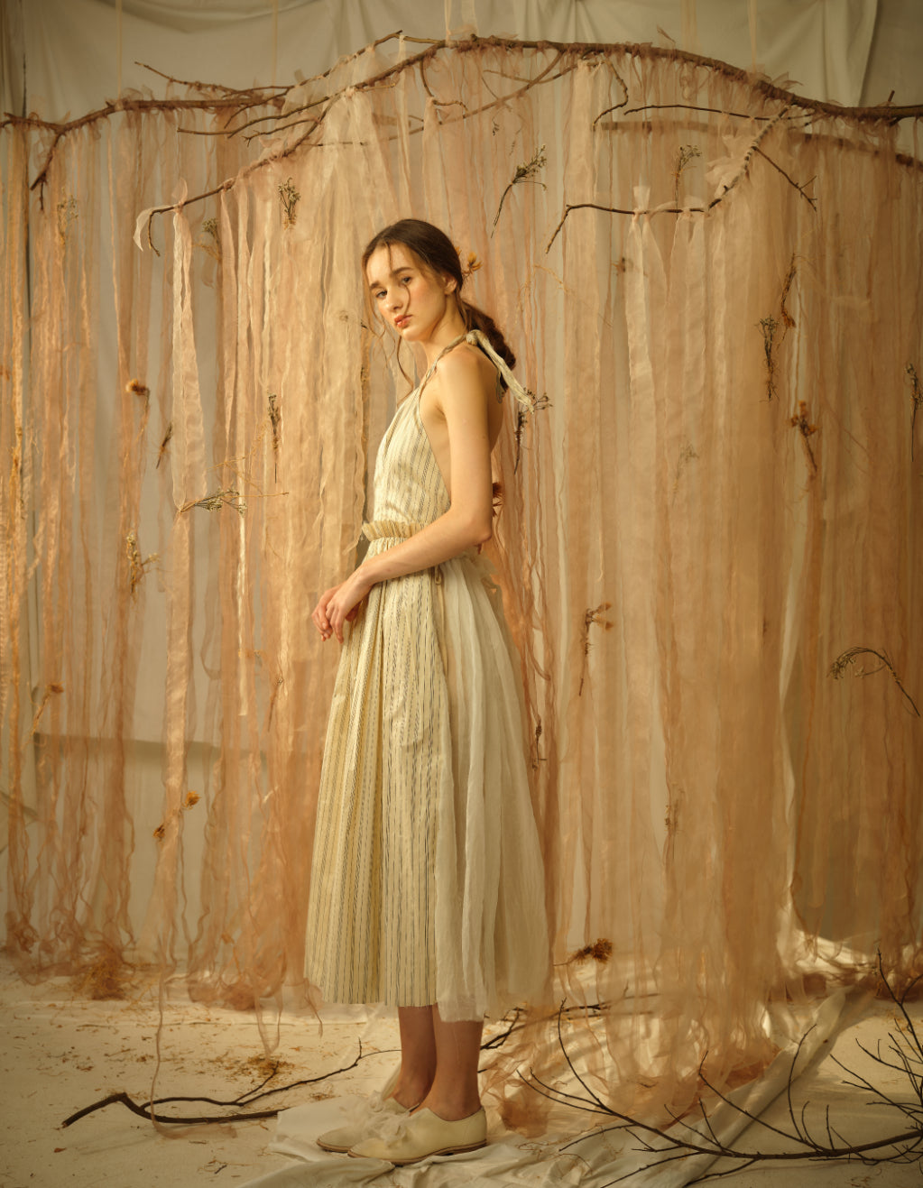 A Tentative Atelier SS21 Lookbook Womens white striped halter dress with a gathered waist