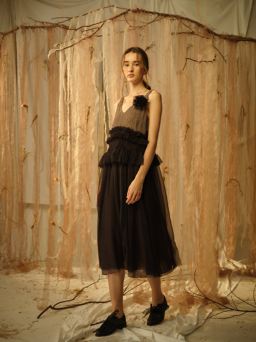 A Tentative Atelier SS21 Lookbook Womens sleeveless brown dress with black tulle flower appliqué and skirt