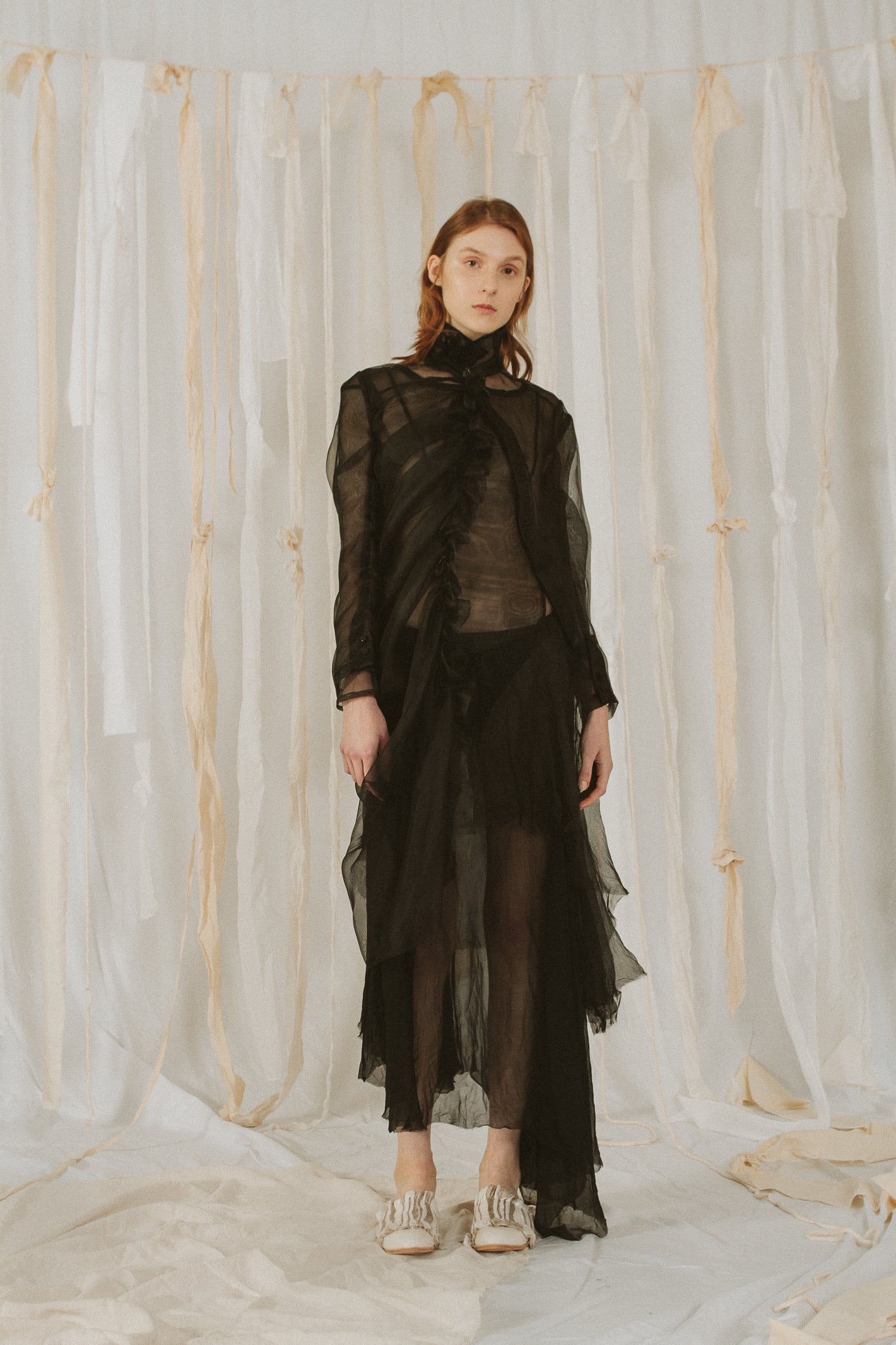 A Tentative Atelier SS18 Lookbook Womens black sheer tulle long dress with ruched and draped detailing
