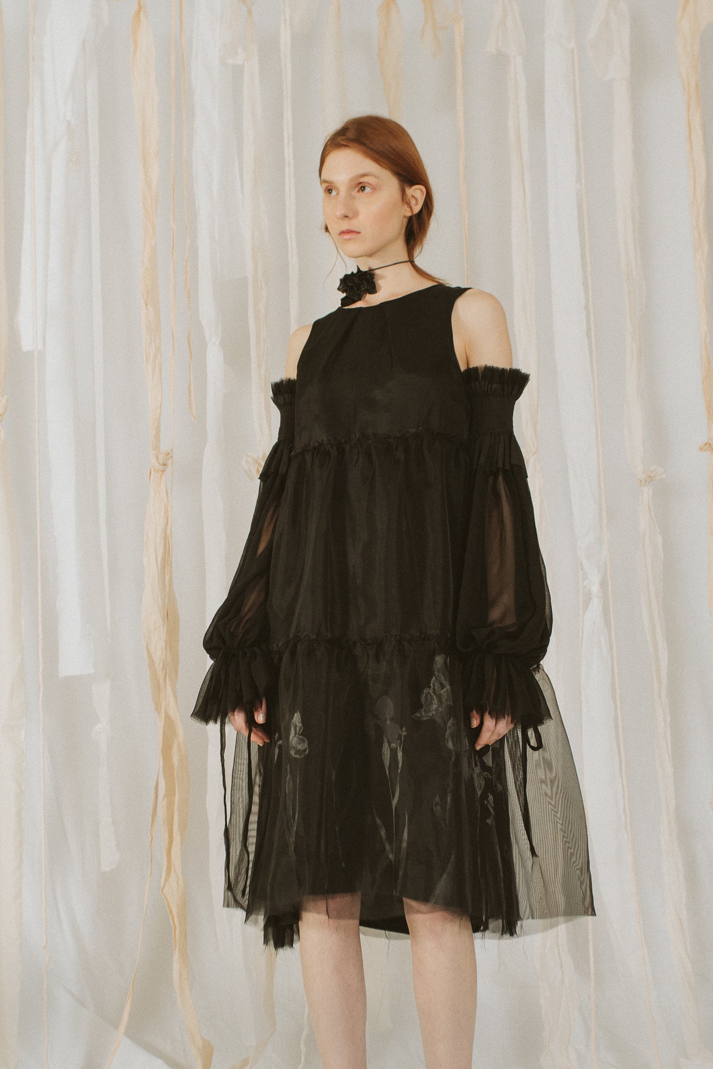 A Tentative Atelier SS18 Lookbook Womens black off shoulder knee length layered dress with sheer black tulle top layer