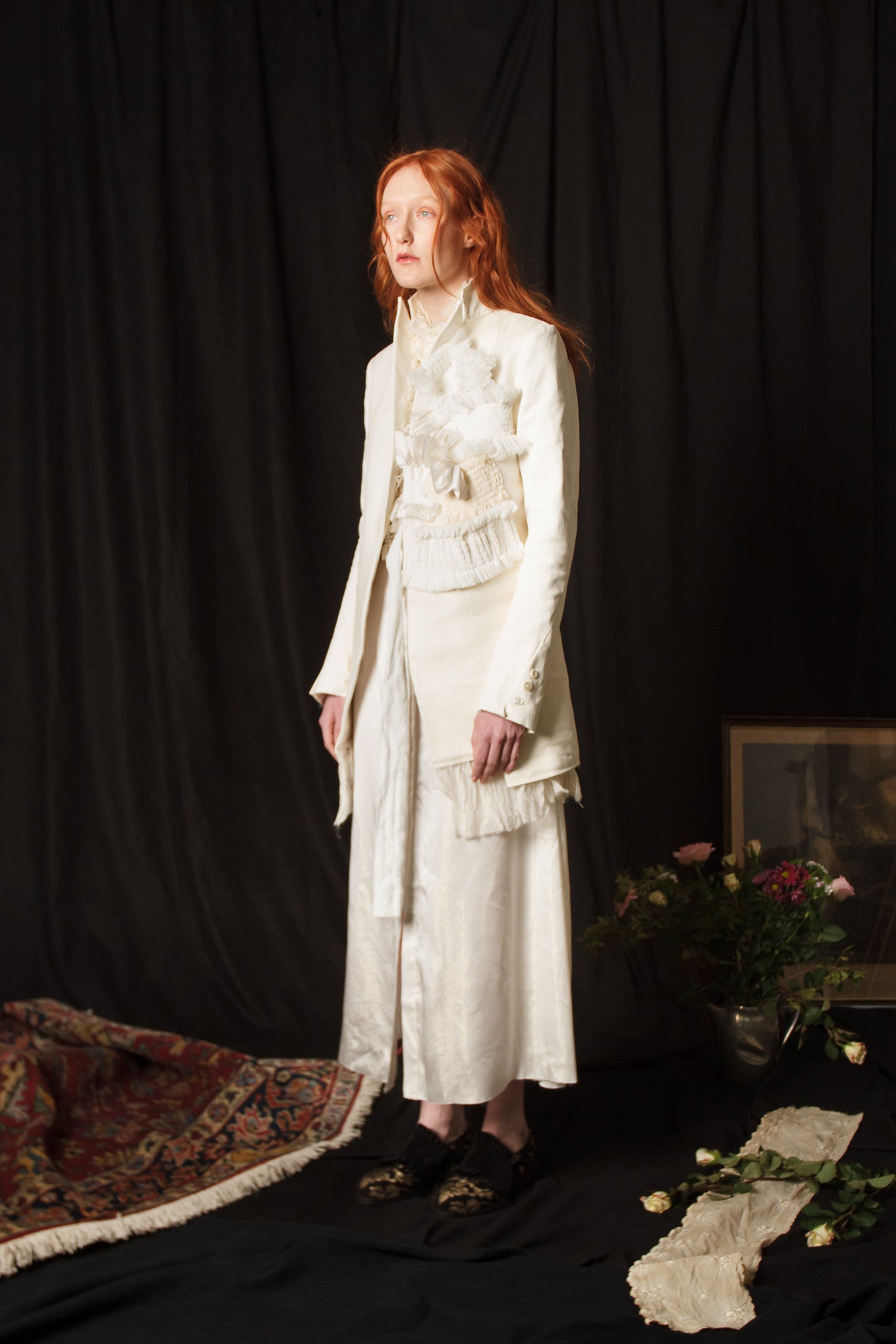 A Tentative Atelier AW18 Lookbook Womens white coat with a series of smocked appliqué on the chest and white silk dress
